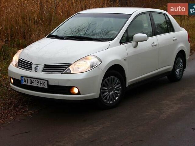 Білий Ніссан Тііда, об'ємом двигуна 1.6 л та пробігом 155 тис. км за 5900 $, фото 1 на Automoto.ua