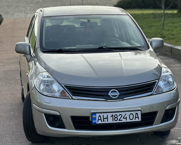 Бежевий Ніссан Тііда, об'ємом двигуна 1.6 л та пробігом 165 тис. км за 6600 $, фото 1 на Automoto.ua