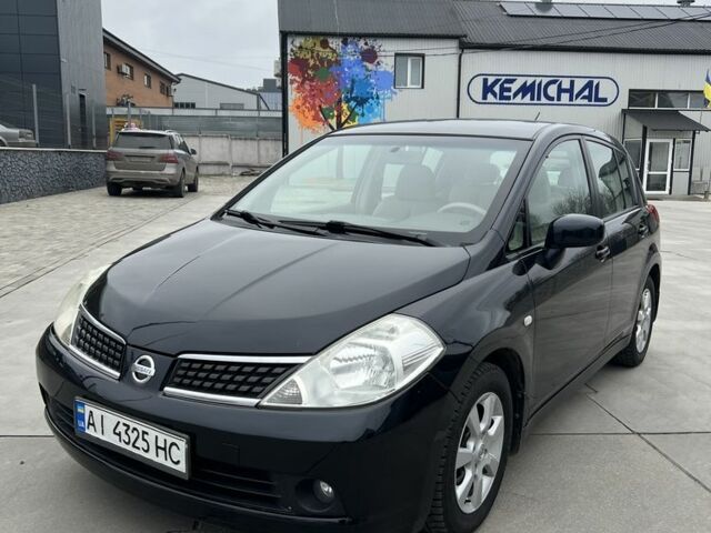 Черный Ниссан Тиида, объемом двигателя 1.6 л и пробегом 188 тыс. км за 5800 $, фото 1 на Automoto.ua