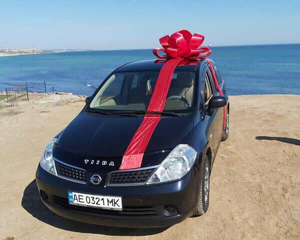 Чорний Ніссан Тііда, об'ємом двигуна 1.6 л та пробігом 179 тис. км за 5000 $, фото 1 на Automoto.ua