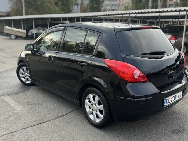Черный Ниссан Тиида, объемом двигателя 1.8 л и пробегом 226 тыс. км за 4200 $, фото 1 на Automoto.ua