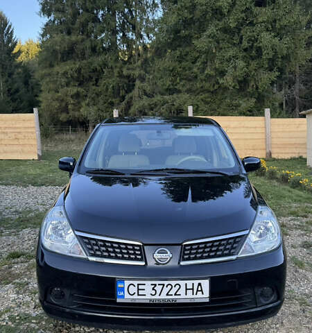 Черный Ниссан Тиида, объемом двигателя 1.6 л и пробегом 199 тыс. км за 5500 $, фото 1 на Automoto.ua