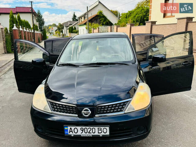 Черный Ниссан Тиида, объемом двигателя 1.6 л и пробегом 187 тыс. км за 5800 $, фото 1 на Automoto.ua