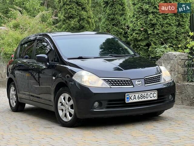 Черный Ниссан Тиида, объемом двигателя 1.6 л и пробегом 84 тыс. км за 7200 $, фото 1 на Automoto.ua