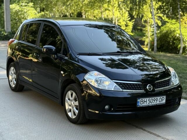 Черный Ниссан Тиида, объемом двигателя 1.6 л и пробегом 260 тыс. км за 5492 $, фото 1 на Automoto.ua
