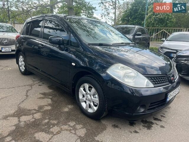 Черный Ниссан Тиида, объемом двигателя 1.6 л и пробегом 230 тыс. км за 5890 $, фото 1 на Automoto.ua