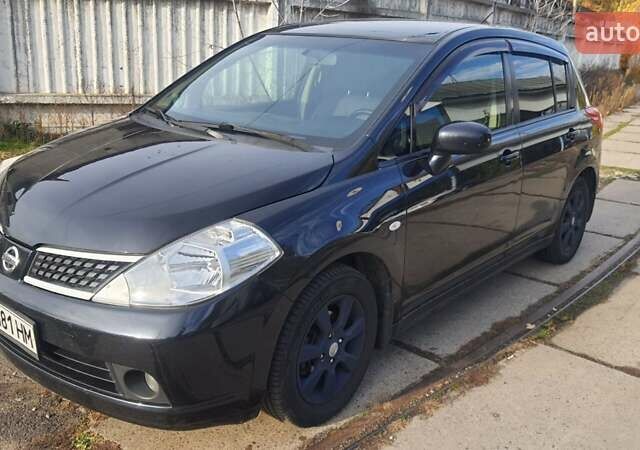 Черный Ниссан Тиида, объемом двигателя 1.6 л и пробегом 229 тыс. км за 5900 $, фото 1 на Automoto.ua