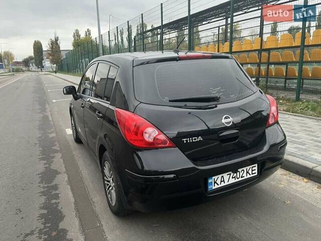 Черный Ниссан Тиида, объемом двигателя 1.6 л и пробегом 129 тыс. км за 5500 $, фото 1 на Automoto.ua