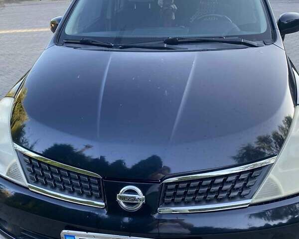 Черный Ниссан Тиида, объемом двигателя 1.6 л и пробегом 218 тыс. км за 5600 $, фото 1 на Automoto.ua