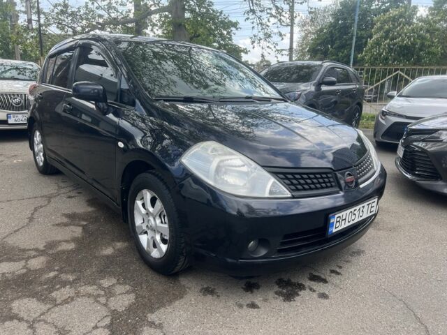 Черный Ниссан Тиида, объемом двигателя 1.6 л и пробегом 230 тыс. км за 5850 $, фото 1 на Automoto.ua