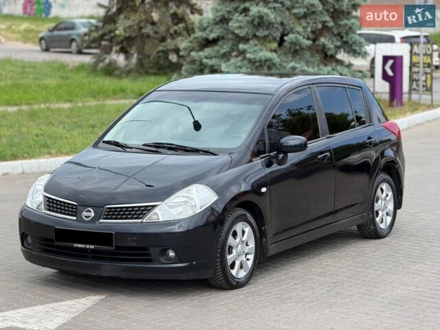 Черный Ниссан Тиида, объемом двигателя 1.6 л и пробегом 170 тыс. км за 5999 $, фото 1 на Automoto.ua