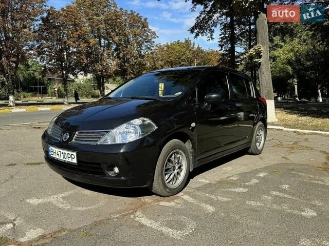 Черный Ниссан Тиида, объемом двигателя 1.6 л и пробегом 157 тыс. км за 5800 $, фото 1 на Automoto.ua