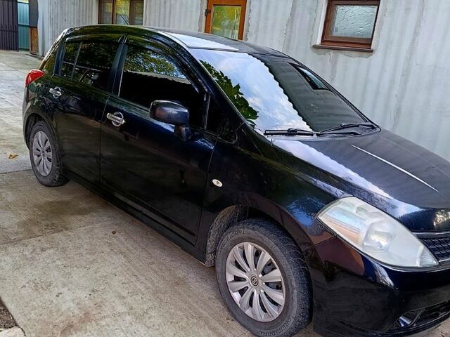 Чорний Ніссан Тііда, об'ємом двигуна 1.6 л та пробігом 203 тис. км за 5300 $, фото 1 на Automoto.ua
