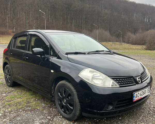 Черный Ниссан Тиида, объемом двигателя 1.6 л и пробегом 138 тыс. км за 6400 $, фото 1 на Automoto.ua