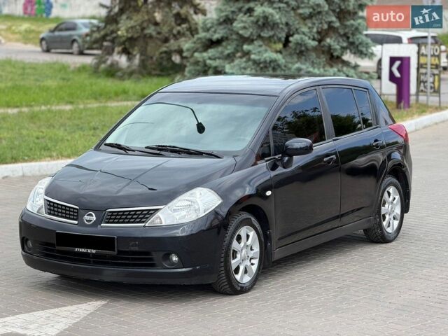 Черный Ниссан Тиида, объемом двигателя 1.6 л и пробегом 170 тыс. км за 6900 $, фото 1 на Automoto.ua