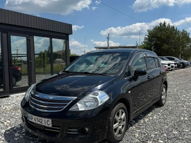 Черный Ниссан Тиида, объемом двигателя 1.49 л и пробегом 151 тыс. км за 7000 $, фото 1 на Automoto.ua