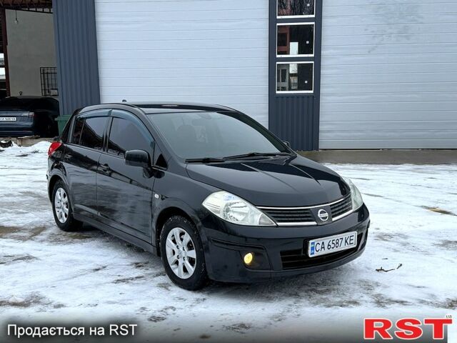 Черный Ниссан Тиида, объемом двигателя 1.8 л и пробегом 200 тыс. км за 4650 $, фото 1 на Automoto.ua