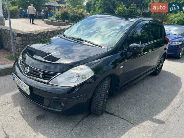 Черный Ниссан Тиида, объемом двигателя 1.6 л и пробегом 237 тыс. км за 6199 $, фото 1 на Automoto.ua