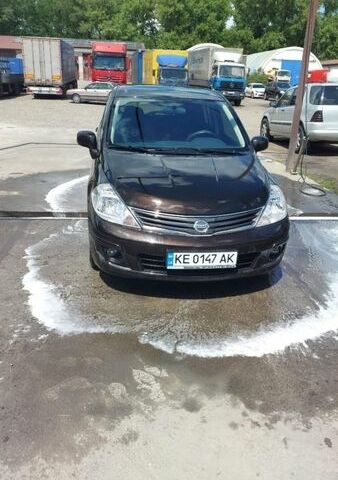 Черный Ниссан Тиида, объемом двигателя 1.6 л и пробегом 57 тыс. км за 7800 $, фото 1 на Automoto.ua