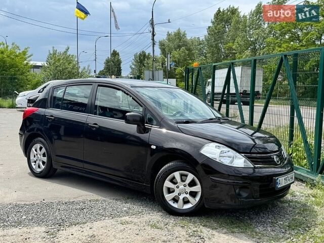 Черный Ниссан Тиида, объемом двигателя 1.6 л и пробегом 166 тыс. км за 7200 $, фото 1 на Automoto.ua