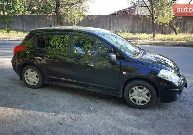 Чорний Ніссан Тііда, об'ємом двигуна 1.6 л та пробігом 53 тис. км за 8300 $, фото 1 на Automoto.ua