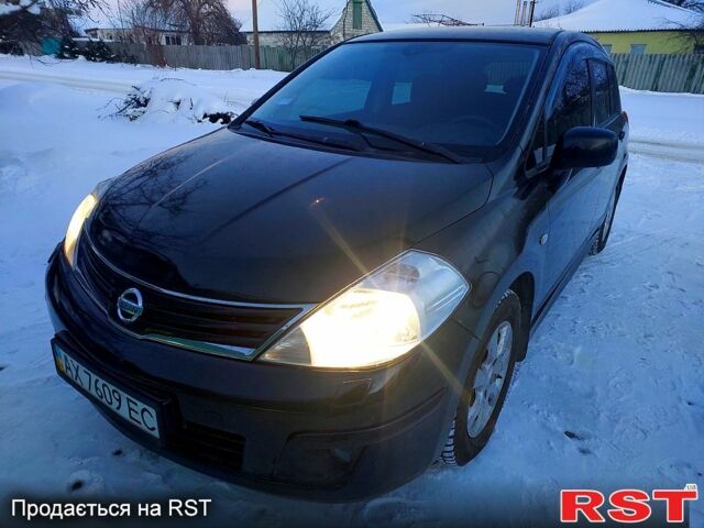Чорний Ніссан Тііда, об'ємом двигуна 1.6 л та пробігом 1290 тис. км за 4500 $, фото 1 на Automoto.ua