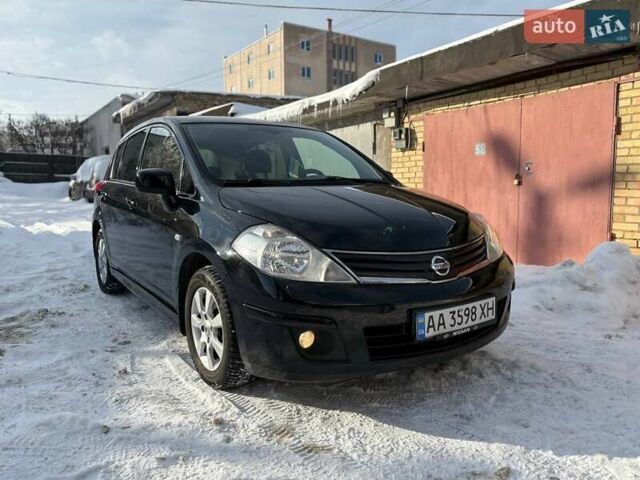 Черный Ниссан Тиида, объемом двигателя 1.6 л и пробегом 115 тыс. км за 8300 $, фото 1 на Automoto.ua