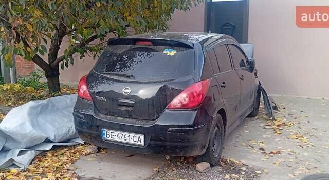 Чорний Ніссан Тііда, об'ємом двигуна 1.6 л та пробігом 280 тис. км за 2000 $, фото 1 на Automoto.ua