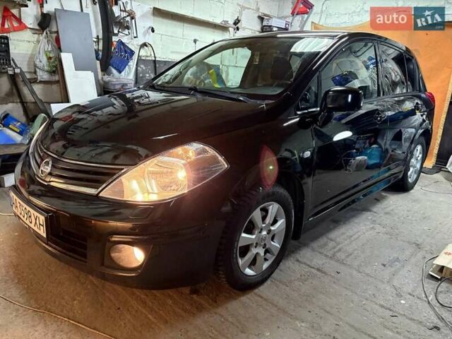 Чорний Ніссан Тііда, об'ємом двигуна 1.6 л та пробігом 115 тис. км за 8800 $, фото 1 на Automoto.ua