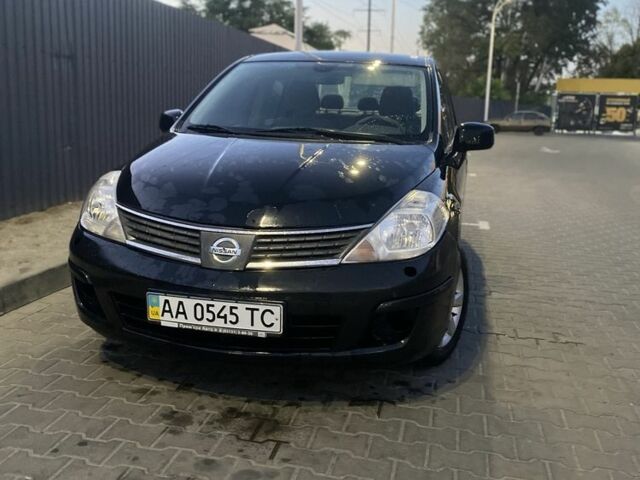 Черный Ниссан Тиида, объемом двигателя 1.6 л и пробегом 200 тыс. км за 4100 $, фото 1 на Automoto.ua
