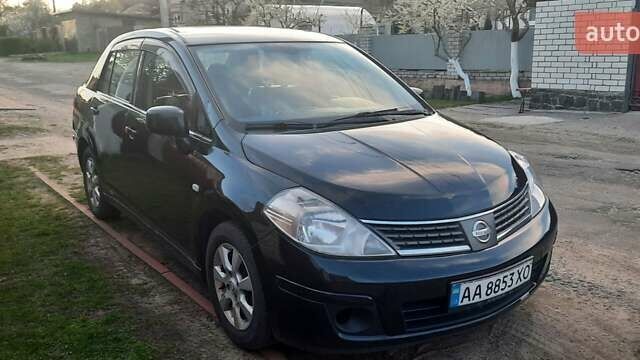 Черный Ниссан Тиида, объемом двигателя 1.8 л и пробегом 270 тыс. км за 2900 $, фото 1 на Automoto.ua