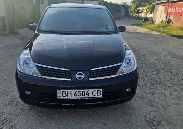 Чорний Ніссан Тііда, об'ємом двигуна 1.6 л та пробігом 261 тис. км за 6500 $, фото 1 на Automoto.ua
