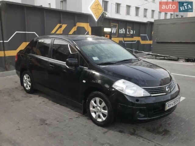 Черный Ниссан Тиида, объемом двигателя 1.6 л и пробегом 190 тыс. км за 6200 $, фото 1 на Automoto.ua
