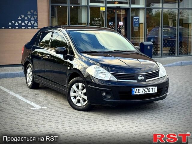 Черный Ниссан Тиида, объемом двигателя 1.6 л и пробегом 137 тыс. км за 5700 $, фото 1 на Automoto.ua