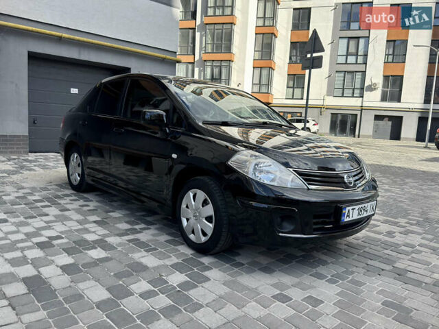 Черный Ниссан Тиида, объемом двигателя 1.6 л и пробегом 192 тыс. км за 5499 $, фото 1 на Automoto.ua