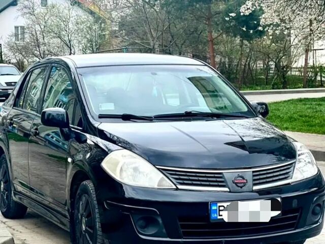 Черный Ниссан Тиида, объемом двигателя 1.6 л и пробегом 177 тыс. км за 3750 $, фото 1 на Automoto.ua