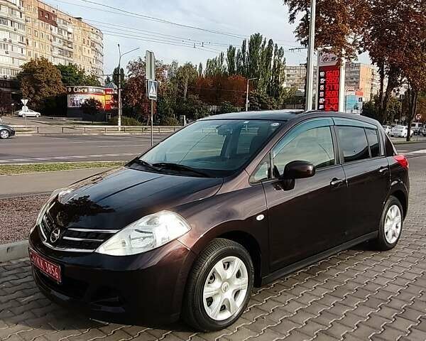 Фиолетовый Ниссан Тиида, объемом двигателя 1.5 л и пробегом 49 тыс. км за 8800 $, фото 1 на Automoto.ua