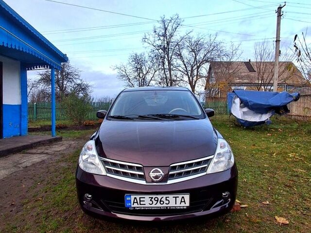Коричневий Ніссан Тііда, об'ємом двигуна 1.5 л та пробігом 86 тис. км за 8000 $, фото 1 на Automoto.ua