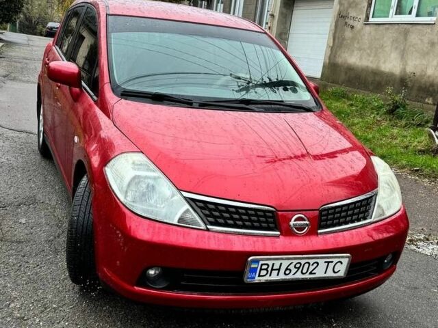 Красный Ниссан Тиида, объемом двигателя 1.6 л и пробегом 160 тыс. км за 6600 $, фото 1 на Automoto.ua