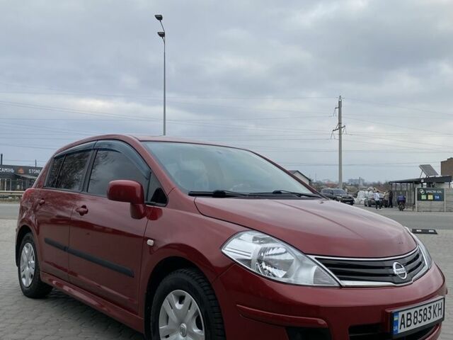 Красный Ниссан Тиида, объемом двигателя 1.6 л и пробегом 59 тыс. км за 9900 $, фото 1 на Automoto.ua