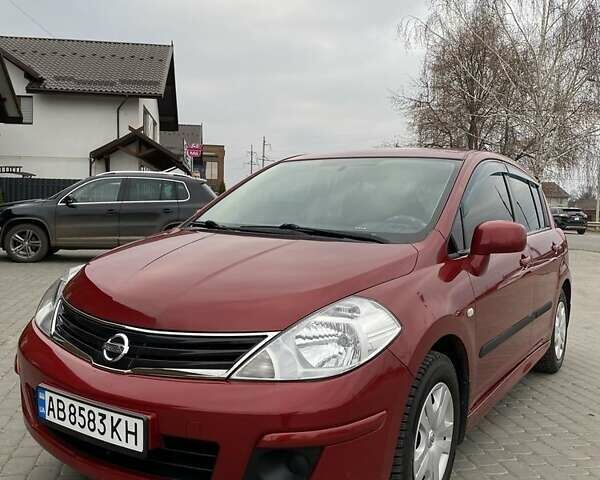 Красный Ниссан Тиида, объемом двигателя 1.6 л и пробегом 59 тыс. км за 9900 $, фото 1 на Automoto.ua