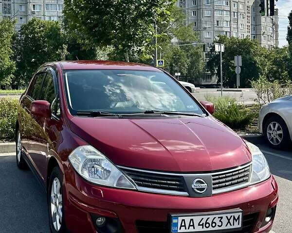 Красный Ниссан Тиида, объемом двигателя 1.6 л и пробегом 193 тыс. км за 7550 $, фото 1 на Automoto.ua