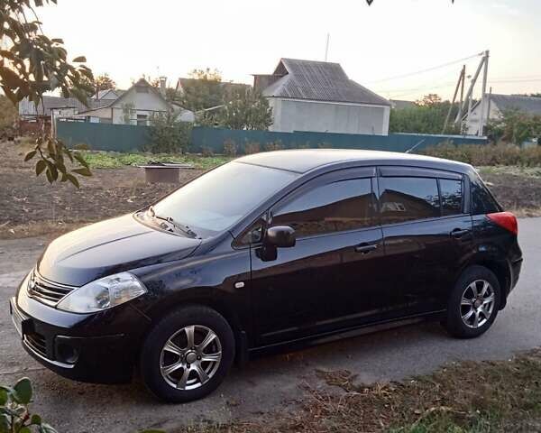 Ниссан Тиида, объемом двигателя 1.6 л и пробегом 91 тыс. км за 8150 $, фото 1 на Automoto.ua