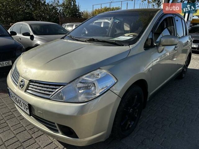 Серый Ниссан Тиида, объемом двигателя 1.8 л и пробегом 200 тыс. км за 5800 $, фото 1 на Automoto.ua