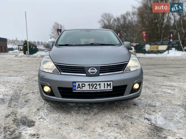 Сірий Ніссан Тііда, об'ємом двигуна 1.8 л та пробігом 207 тис. км за 4599 $, фото 1 на Automoto.ua