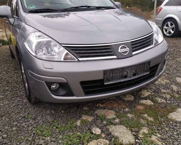 Сірий Ніссан Тііда, об'ємом двигуна 1.8 л та пробігом 206 тис. км за 4200 $, фото 1 на Automoto.ua