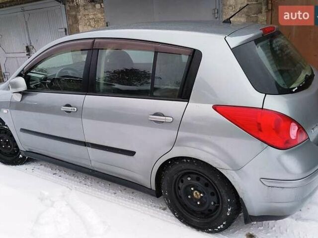 Сірий Ніссан Тііда, об'ємом двигуна 1.6 л та пробігом 214 тис. км за 7200 $, фото 1 на Automoto.ua