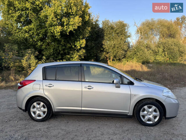 Серый Ниссан Тиида, объемом двигателя 1.5 л и пробегом 106 тыс. км за 8299 $, фото 1 на Automoto.ua