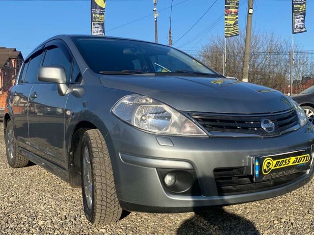 Серый Ниссан Тиида, объемом двигателя 1.6 л и пробегом 119 тыс. км за 7700 $, фото 1 на Automoto.ua