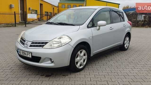 Серый Ниссан Тиида, объемом двигателя 1.6 л и пробегом 113 тыс. км за 6996 $, фото 1 на Automoto.ua